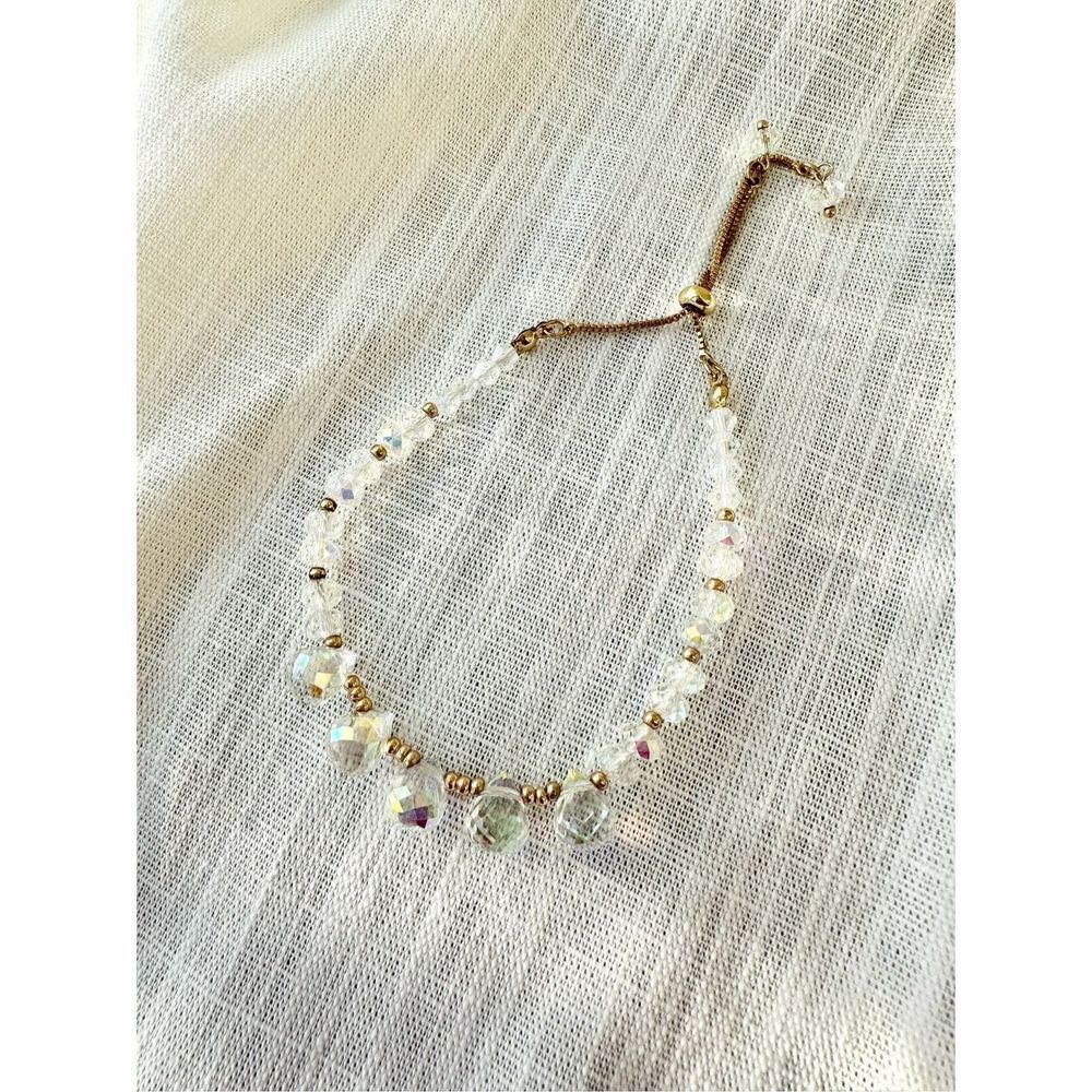 Iridescent beaded friendship bracelet with gold color